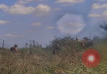 Image of US soldiers running Vietnam, 1968, second 59 stock footage video 65675080525