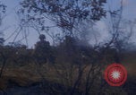 Image of US soldiers running Vietnam, 1968, second 61 stock footage video 65675080525