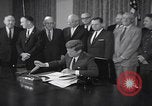 Image of President Kennedy signing Washington DC USA, 1963, second 3 stock footage video 65675080556
