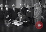 Image of President Kennedy signing Washington DC USA, 1963, second 5 stock footage video 65675080556