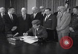 Image of President Kennedy signing Washington DC USA, 1963, second 6 stock footage video 65675080556