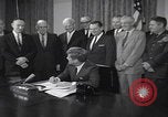 Image of President Kennedy signing Washington DC USA, 1963, second 11 stock footage video 65675080556