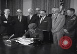 Image of President Kennedy signing Washington DC USA, 1963, second 13 stock footage video 65675080556