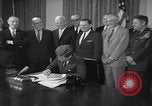 Image of President Kennedy signing Washington DC USA, 1963, second 14 stock footage video 65675080556