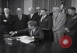 Image of President Kennedy signing Washington DC USA, 1963, second 16 stock footage video 65675080556