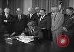 Image of President Kennedy signing Washington DC USA, 1963, second 18 stock footage video 65675080556