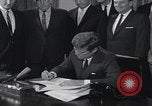 Image of President Kennedy signing Washington DC USA, 1963, second 19 stock footage video 65675080556