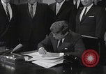 Image of President Kennedy signing Washington DC USA, 1963, second 25 stock footage video 65675080556