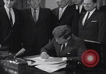 Image of President Kennedy signing Washington DC USA, 1963, second 27 stock footage video 65675080556