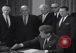 Image of President Kennedy signing Washington DC USA, 1963, second 30 stock footage video 65675080556