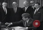 Image of President Kennedy signing Washington DC USA, 1963, second 32 stock footage video 65675080556