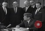 Image of President Kennedy signing Washington DC USA, 1963, second 34 stock footage video 65675080556