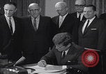 Image of President Kennedy signing Washington DC USA, 1963, second 36 stock footage video 65675080556