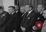 Image of President Kennedy signing Washington DC USA, 1963, second 40 stock footage video 65675080556
