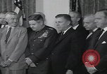 Image of President Kennedy signing Washington DC USA, 1963, second 42 stock footage video 65675080556