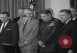 Image of President Kennedy signing Washington DC USA, 1963, second 43 stock footage video 65675080556