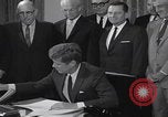 Image of President Kennedy signing Washington DC USA, 1963, second 47 stock footage video 65675080556