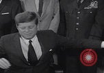 Image of President Kennedy signing Washington DC USA, 1963, second 59 stock footage video 65675080556