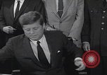 Image of President Kennedy signing Washington DC USA, 1963, second 60 stock footage video 65675080556