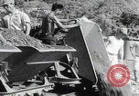 Image of Hainan Island iron ore mining Hainan Island China, 1941, second 39 stock footage video 65675080581