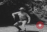 Image of Draw shoot hip position United States USA, 1959, second 7 stock footage video 65675080588