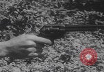 Image of Draw shoot hip position United States USA, 1959, second 8 stock footage video 65675080588