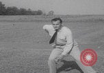 Image of Draw shoot hip position United States USA, 1959, second 23 stock footage video 65675080588