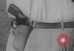 Image of Draw shoot hip position United States USA, 1959, second 33 stock footage video 65675080588