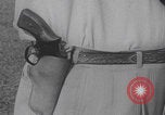 Image of Draw shoot hip position United States USA, 1959, second 35 stock footage video 65675080588
