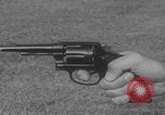 Image of Smith Wesson Model 10 revolver grip United States USA, 1959, second 4 stock footage video 65675080589