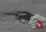 Image of Smith Wesson Model 10 revolver grip United States USA, 1959, second 5 stock footage video 65675080589