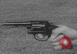 Image of Smith Wesson Model 10 revolver grip United States USA, 1959, second 6 stock footage video 65675080589