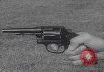 Image of Smith Wesson Model 10 revolver grip United States USA, 1959, second 7 stock footage video 65675080589