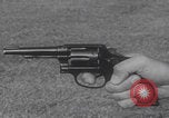 Image of Smith Wesson Model 10 revolver grip United States USA, 1959, second 8 stock footage video 65675080589