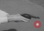 Image of Smith Wesson Model 10 revolver grip United States USA, 1959, second 27 stock footage video 65675080589