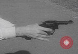 Image of Smith Wesson Model 10 revolver grip United States USA, 1959, second 29 stock footage video 65675080589