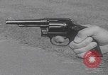 Image of Smith Wesson Model 10 revolver grip United States USA, 1959, second 43 stock footage video 65675080589