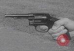 Image of Smith Wesson Model 10 revolver grip United States USA, 1959, second 48 stock footage video 65675080589