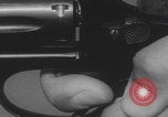 Image of Smith Wesson Model 10 revolver grip United States USA, 1959, second 54 stock footage video 65675080589