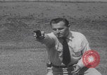 Image of FBI double action shooting United States USA, 1959, second 52 stock footage video 65675080590