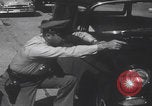 Standbild Einbruchversuch United States USA, 1959, aus Sekunde 14 historischem Filmmaterial Videoclip 65675080591