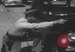 Standbild Einbruchversuch United States USA, 1959, aus Sekunde 15 historischem Filmmaterial Videoclip 65675080591