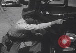 Standbild Einbruchversuch United States USA, 1959, aus Sekunde 19 historischem Filmmaterial Videoclip 65675080591