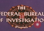 Standbild FBI-Abwehrtaktik United States USA, 1959, aus Sekunde 17 historischem Filmmaterial Videoclip 65675080595