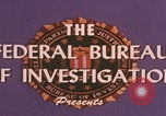 Standbild FBI-Abwehrtaktik United States USA, 1959, aus Sekunde 28 historischem Filmmaterial Videoclip 65675080595