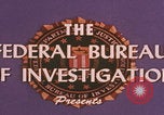 Standbild FBI-Abwehrtaktik United States USA, 1959, aus Sekunde 29 historischem Filmmaterial Videoclip 65675080595