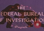 Standbild FBI-Abwehrtaktik United States USA, 1959, aus Sekunde 31 historischem Filmmaterial Videoclip 65675080595