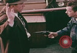 Image of FBI agent disarms criminal United States USA, 1959, second 58 stock footage video 65675080597