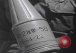 Image of US soldiers captured North Vietnamese weapons Vietnam, 1965, second 33 stock footage video 65675080610