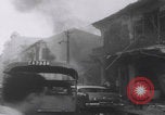 Standbild Vietcong-Autobombardement 1965 Saigon Vietnam, 1965, aus Sekunde 23 historischem Filmmaterial Videoclip 65675080612